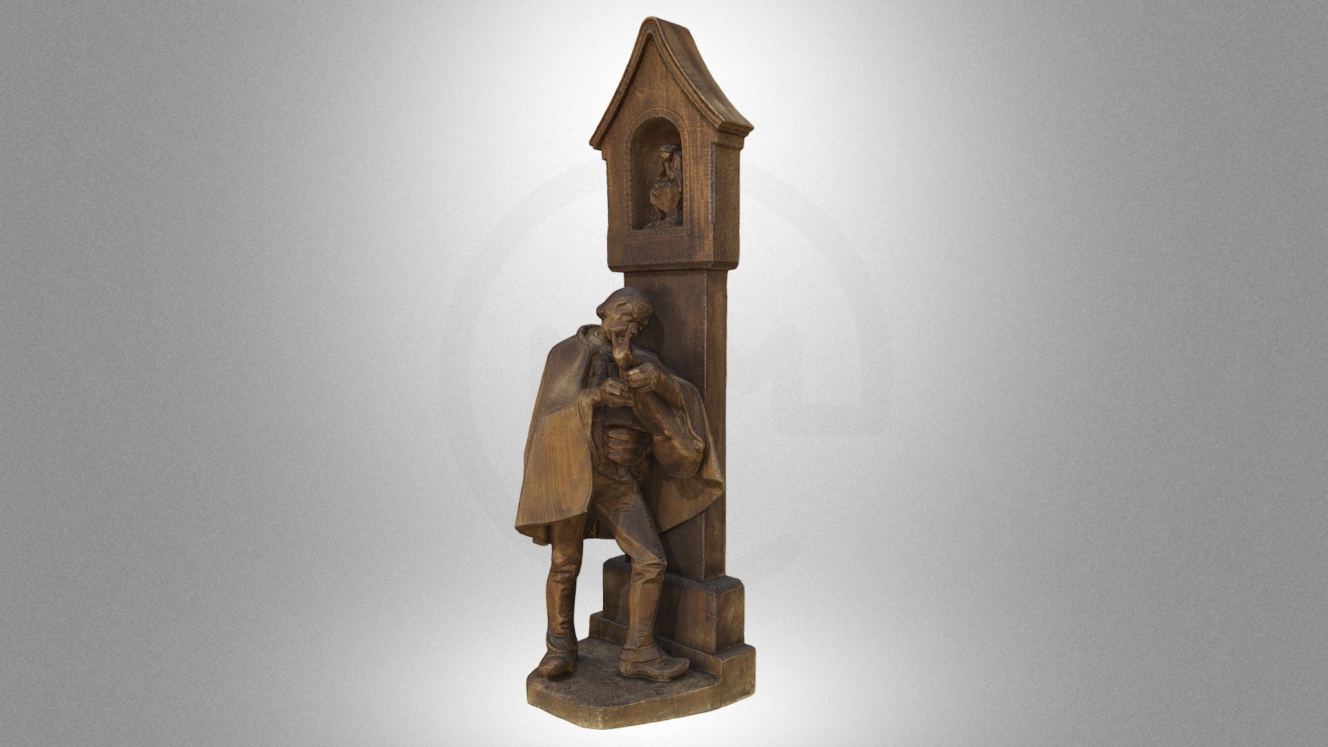 Sculpture “Piper playing at the shrine”