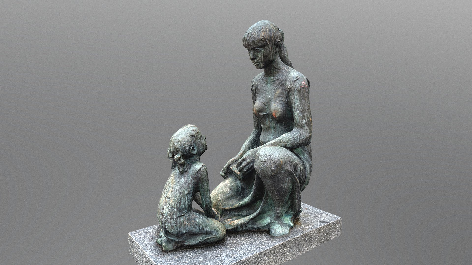 Woman and pupil sculpture