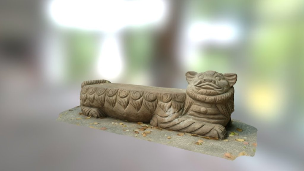 A lion-like stone bench