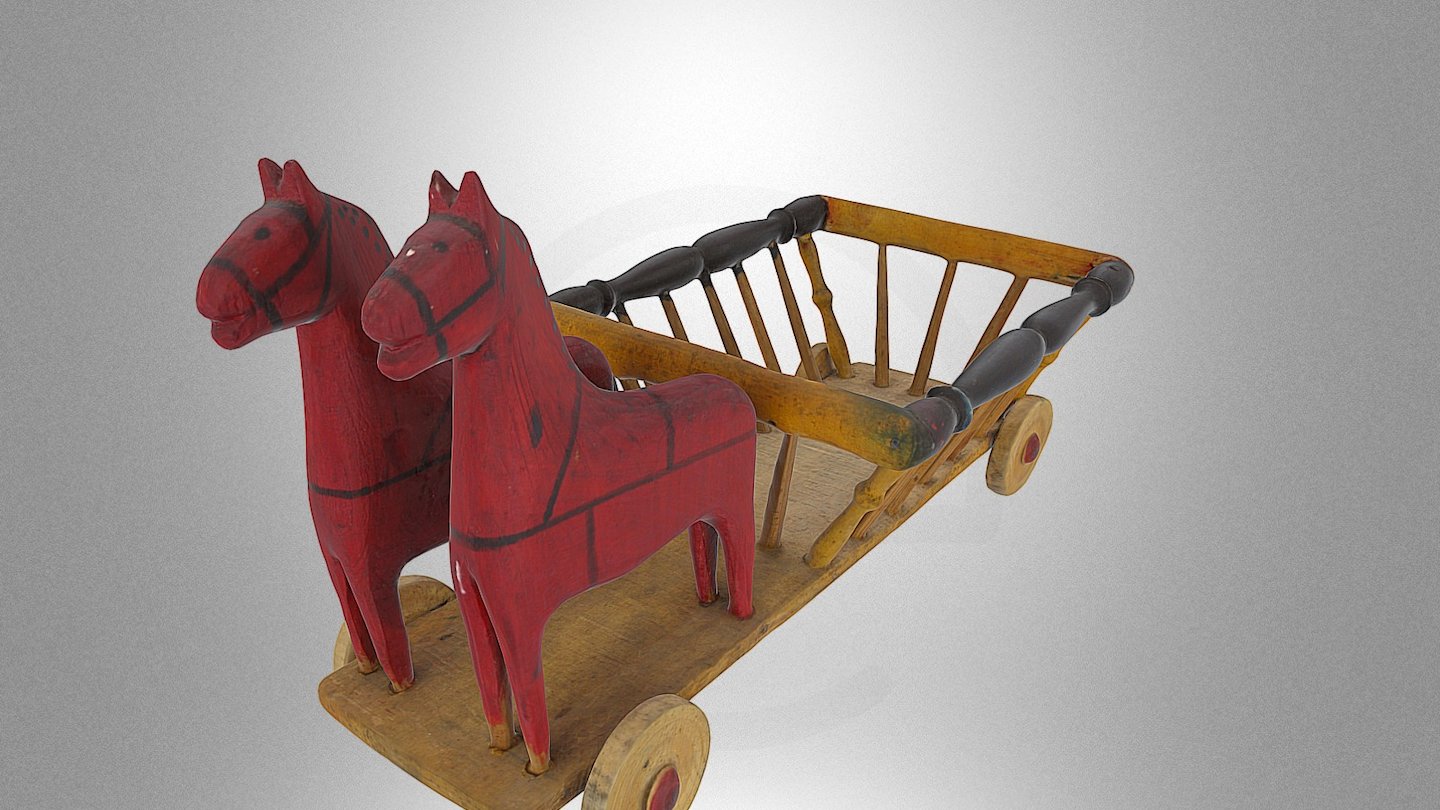 Wooden toy — “A cart pulled by horses”