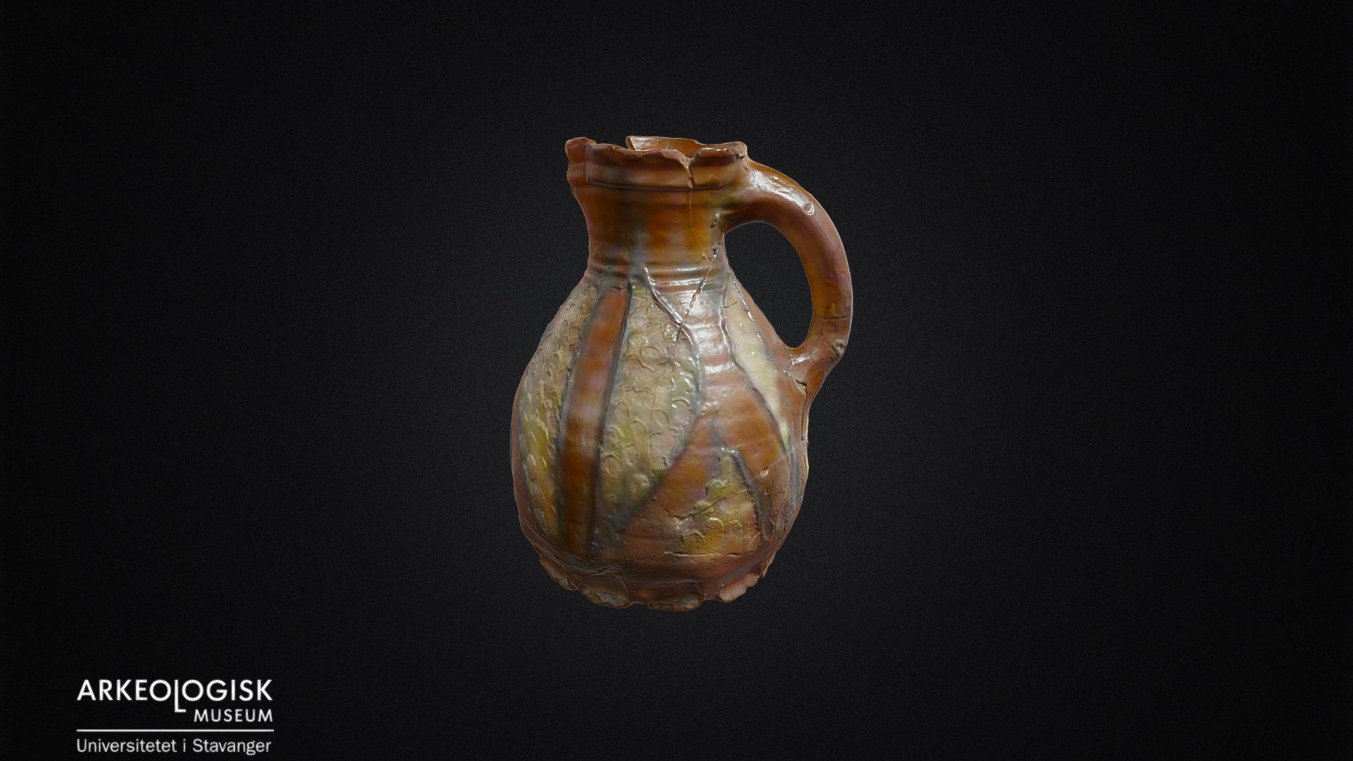Medieval glazed jug of clay