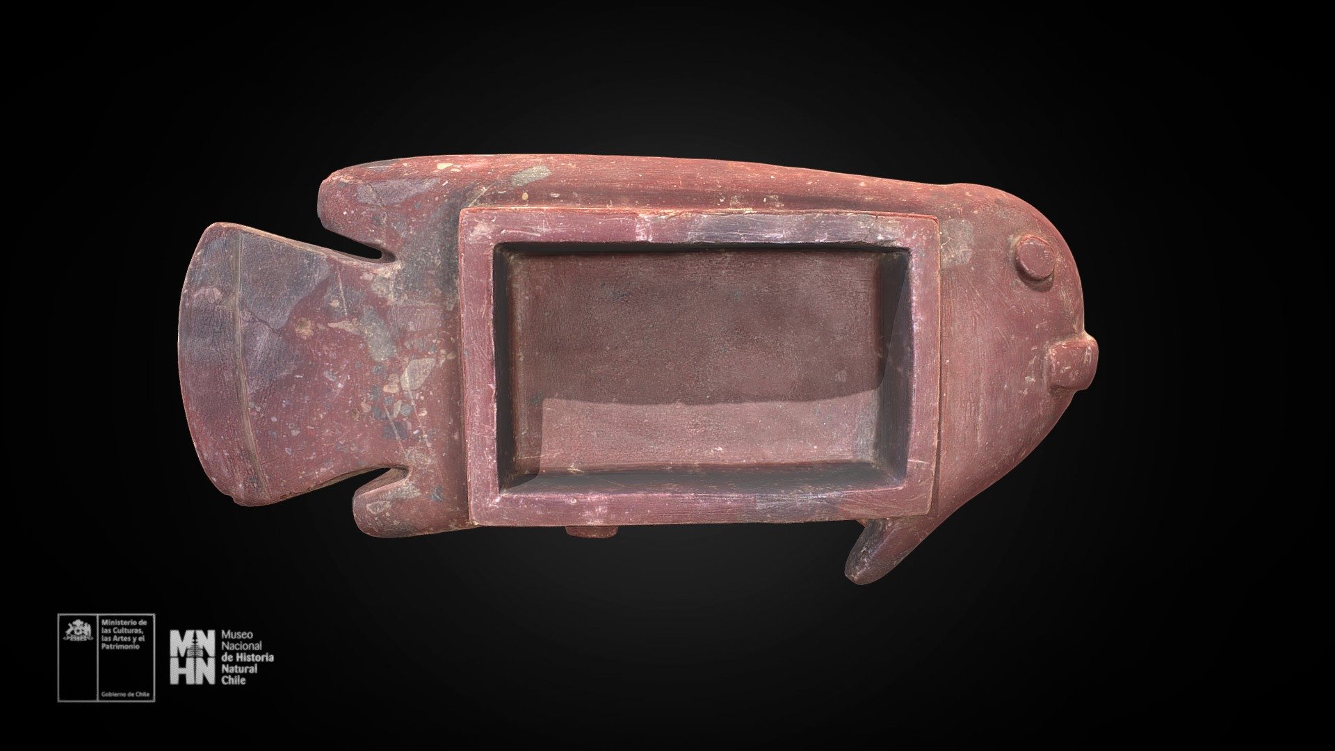 Recipiente de piedra en forma de pez