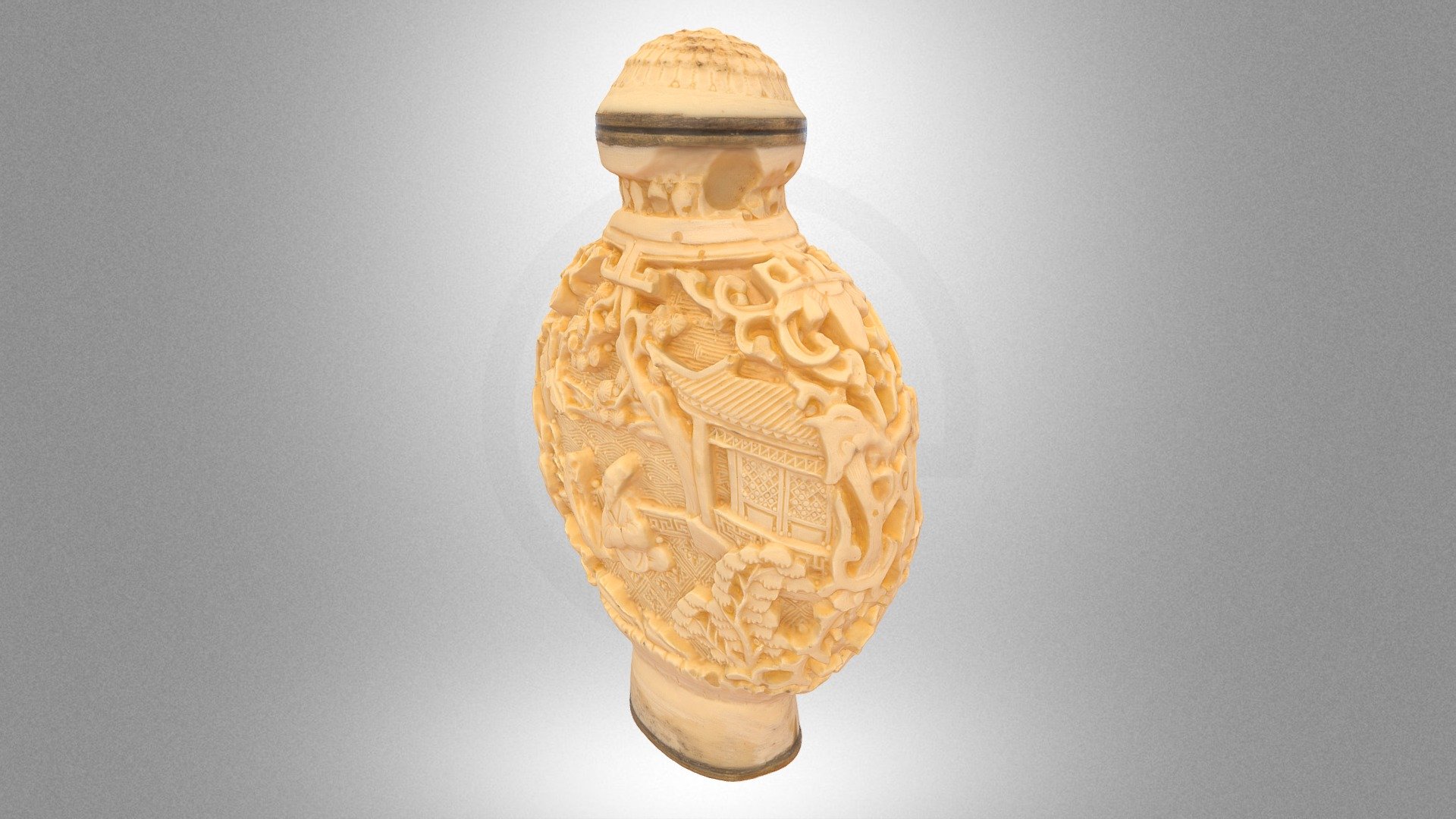 Carved perfume bottle