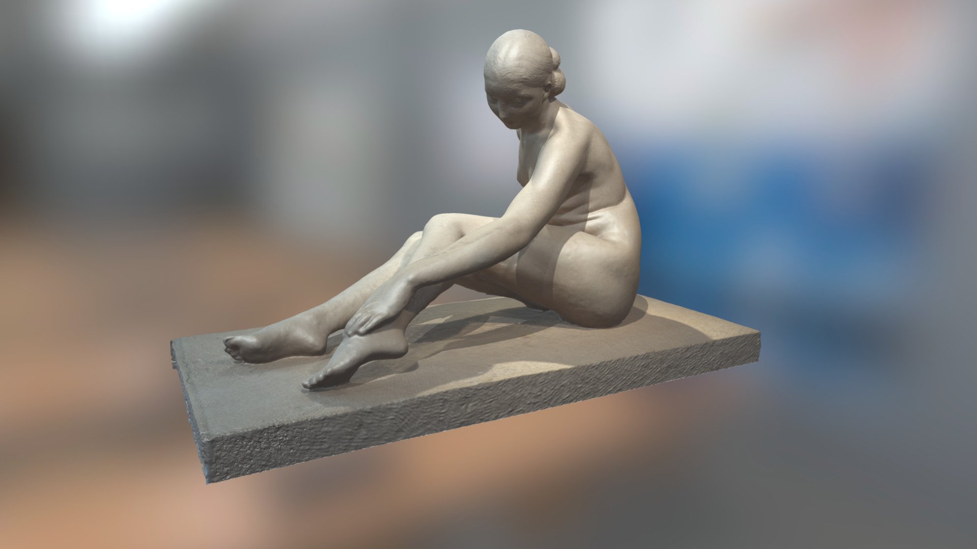 Baigneuse assise