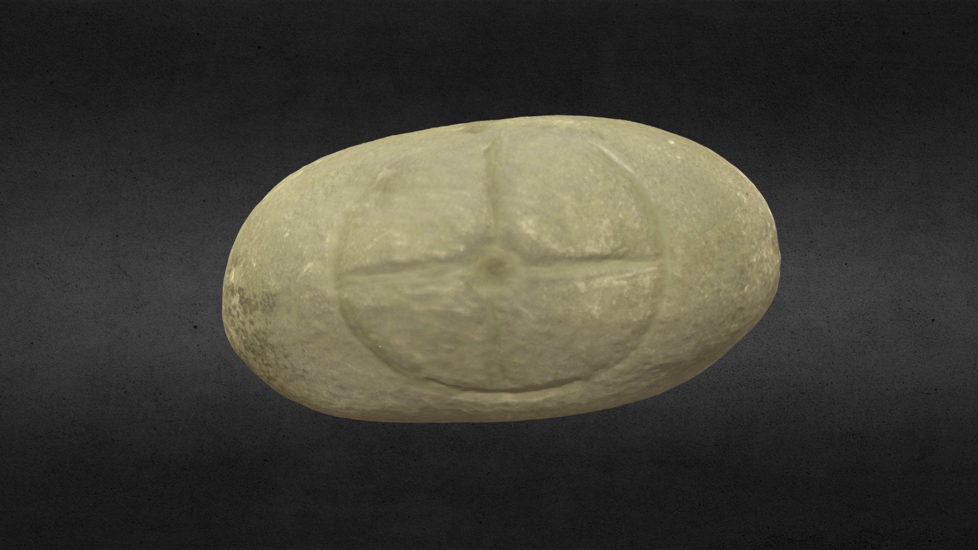 Small, cross-inscribed pebble