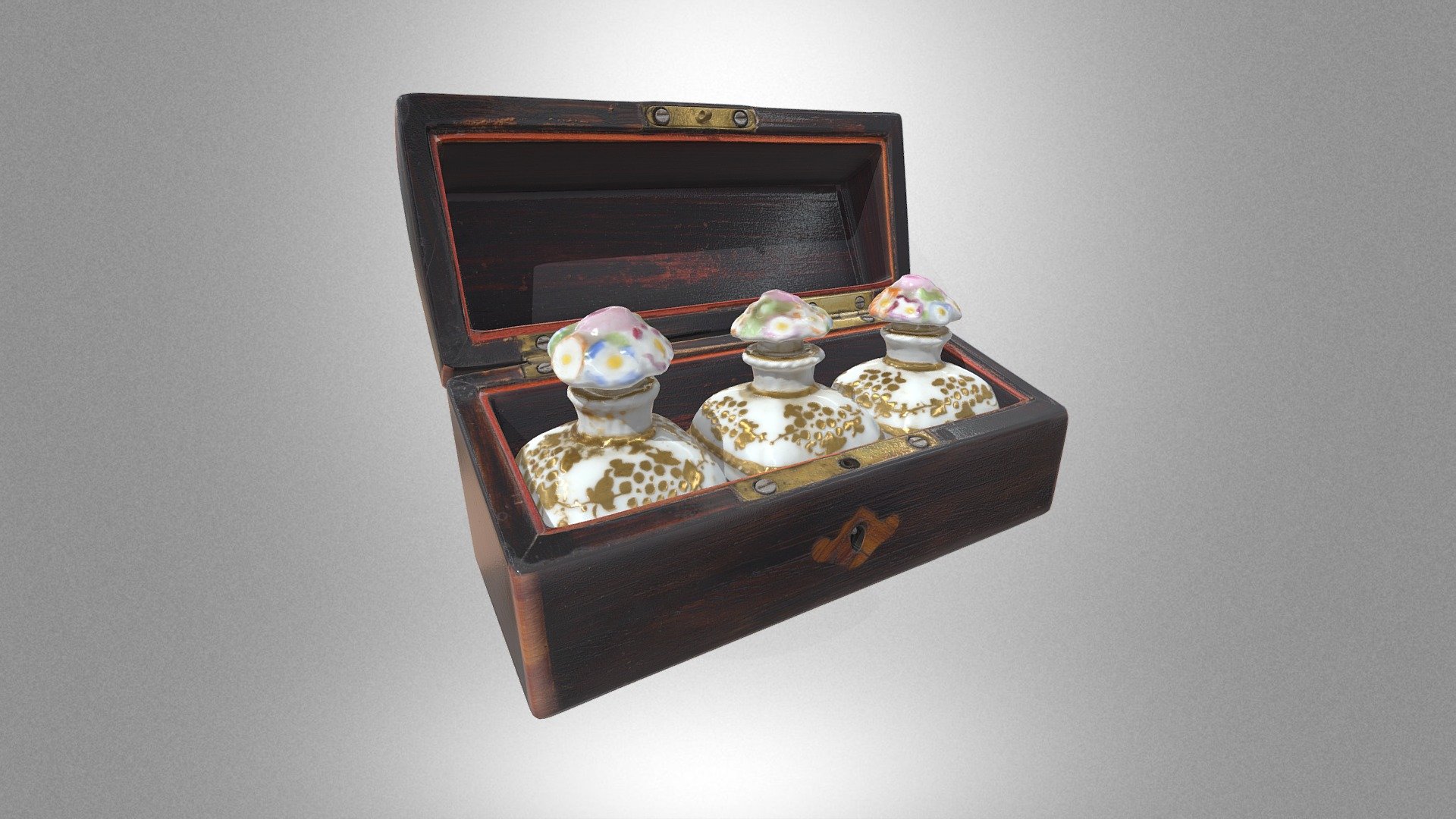 Casket with perfume bottles